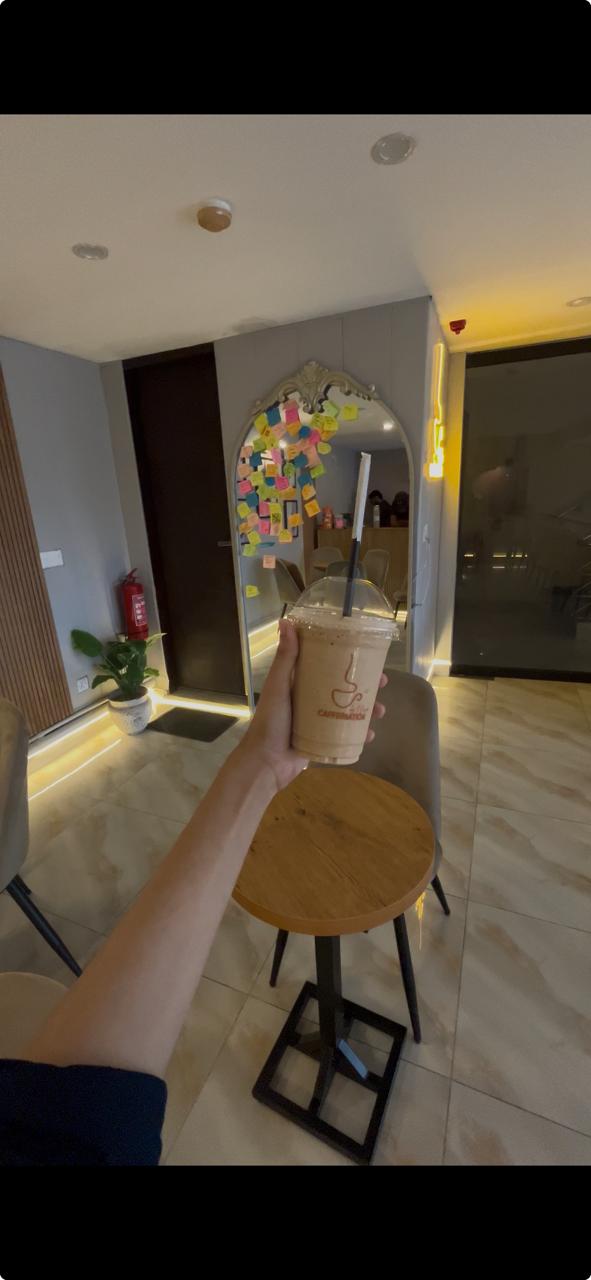 The coffee being poured at Caffeination by I Desire